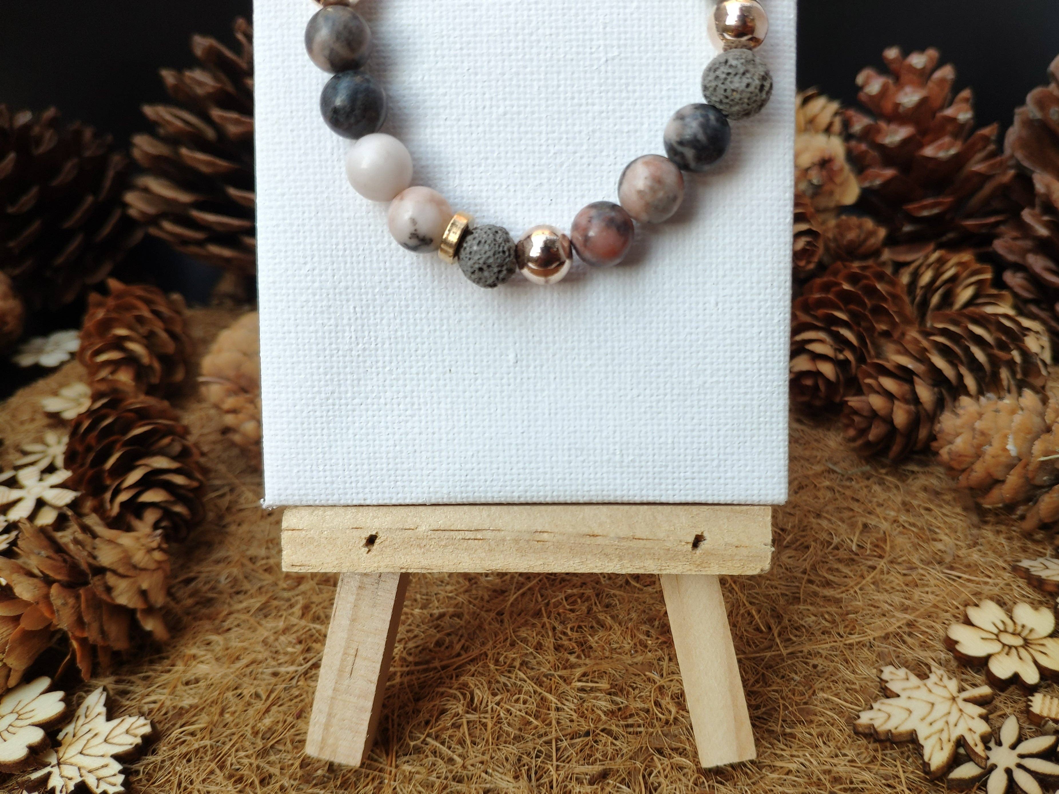 Bracelet en pierre de lave zebra rose