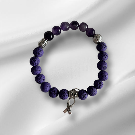 Pierres de lave mauves et argentees et amethystes et budda